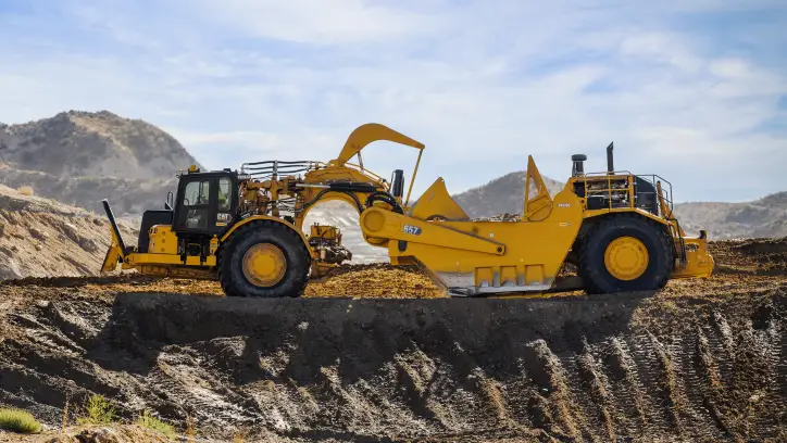 Wheel-Tractor-Scraper-In-Action