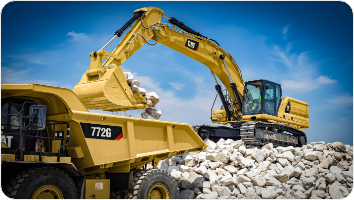 Small Cat Excavator in Toronto - Break Apart Rocks & Concrete